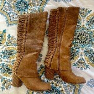 Gently worn women’s size 8.5 tall boots by Fergalicious!